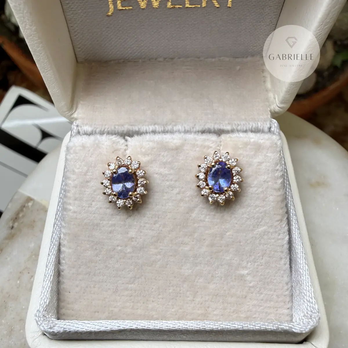 Aretes topitos tanzanita ovalada con diamantes en oro 18k-4