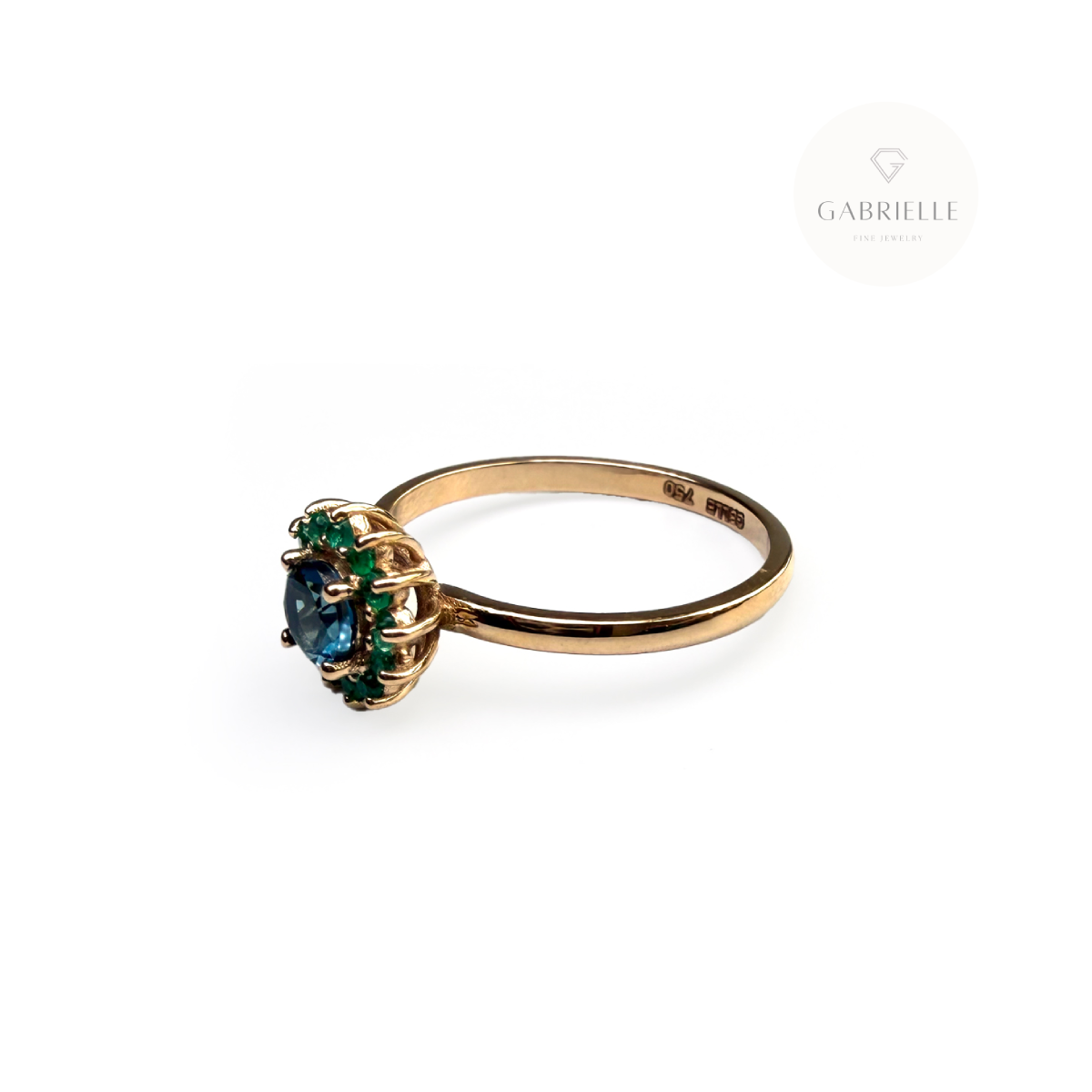 Anillo Cluster de Oro 18k con Topacio 4mm y Esmeraldas 1.5mm-3